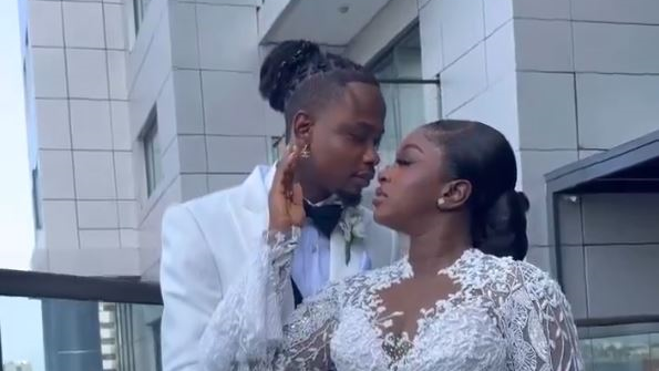 Yhemolee and his bride share moment together